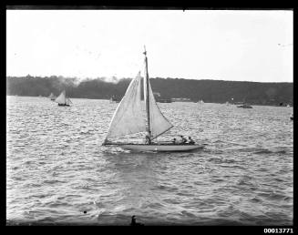 Portside view of a yacht on Sydney Harbour