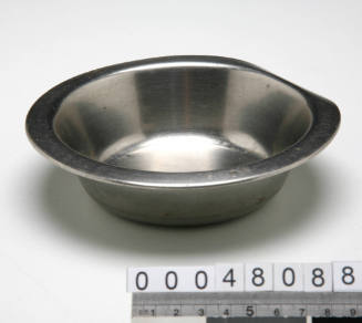 Stainless steel pudding bowl from Fairbridge Farm School, Molong