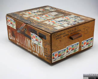 A wooden tally box with Ben Johnson painted in on the front and back
