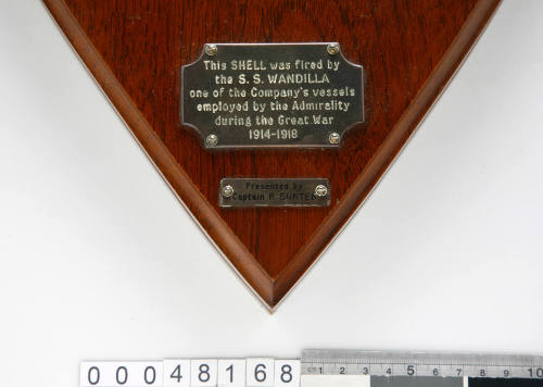 Part of a commemorative gong made from a shell fired by the SS WANDILLA during its war service in WWI