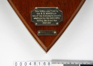 Part of a commemorative gong made from a shell fired by the SS WANDILLA during its war service in WWI