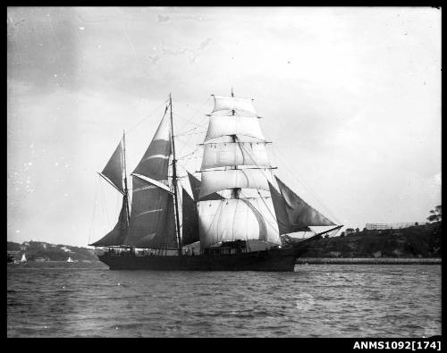 Image of three masted barquentine with sails set