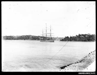 A three masted full rigged ship at anchor taken from the starboard view