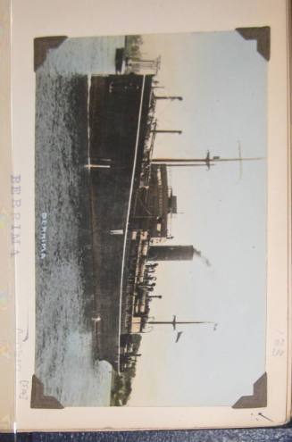 PHOTOGRAPH. WATT, JOHN. "BERRIMA". SILVER GELATIN PRINT. BLACK AND WHITE PHOTOGRAPH, HAND COLOURED OVER MAINLY SKY AND WATER, DEPICTING PORT SIDE VIEW OF SHIP "BERRIMA" UNDER WAY JUST OFF SHORE. BRIDGE, ACCOMMODATION SUPERSTRUCTURE, SINGLE FUNNEL, MIDSHIP