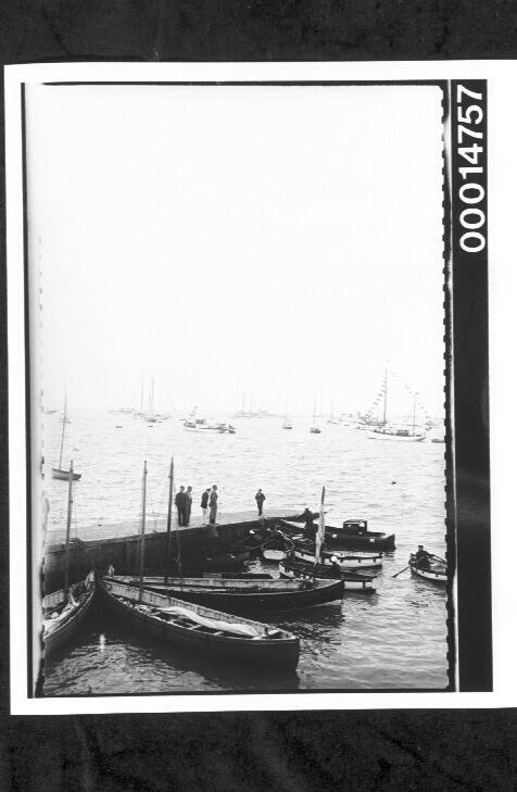 Dinghies moored to a jetty at Cowes, south coast of England