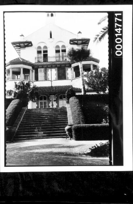 The front entrance of a large Spanish residence