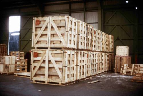 Slide depicting 16 wooden crates stacked