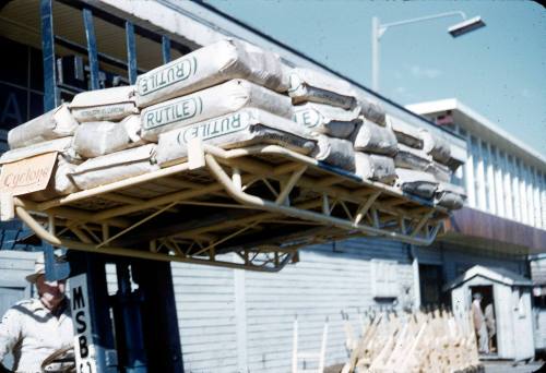 Slide depicting a forklift moving bags