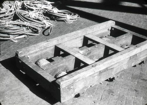 Slide depicting a wooden crate on wheels