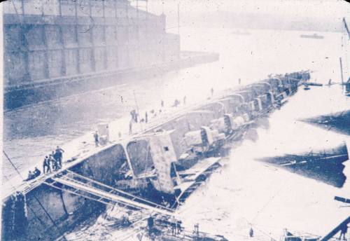 Slide depicting a ship laying on its side