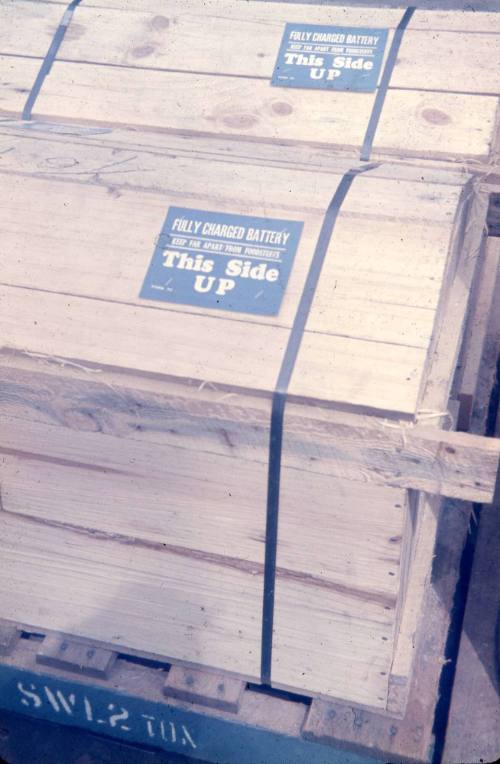 Slide depicting A coloured slide depicting wood on a pallet