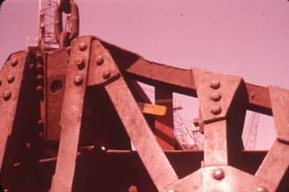 Slide depicting a large metal machine