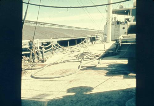 Slide depicting ropes lying on deck