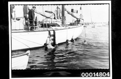 Midshipmen of HMAS AUSTRALIA cleaning the hull of the yacht SIRIUS at Malta