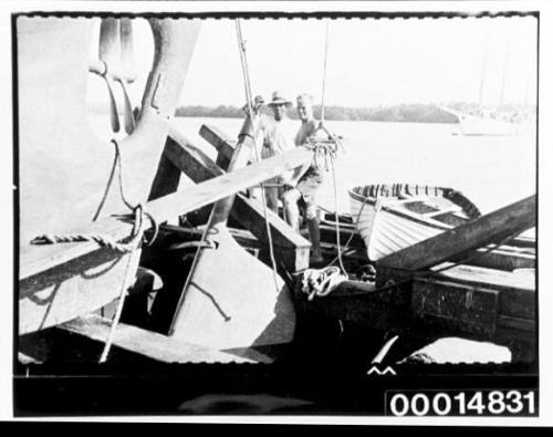 Richard Nossiter by the stern of yacht SIRIUS on slips at Colón, Panama