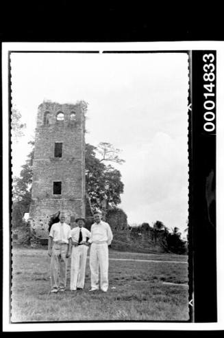 Richard and Harold Nossiter Snr with a friend near the ruins of a cathedral tower, Panama