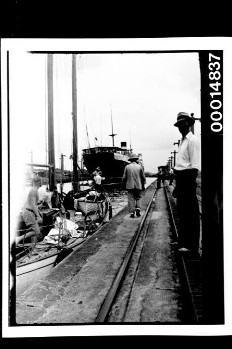 Yacht SIRIUS shares a lock with a large steamer on the Panama Canal