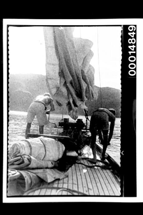 Attending to the sails of yacht SIRIUS, Cocos Islands