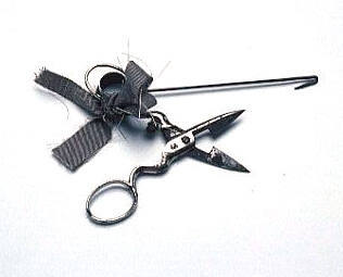 Scissors, thimble and hook used by tailor Costas Melidis