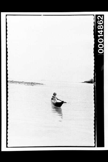 Canoeing in the sandy shallows of a Galapagos Island