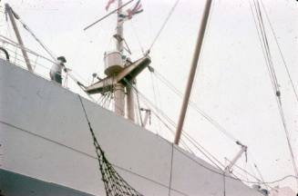 Slide depicting the side of a vessle with metal mast