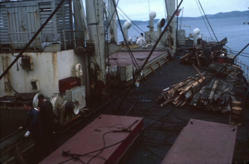 Slide depicting the deck of a ship with wooden planks bundled together