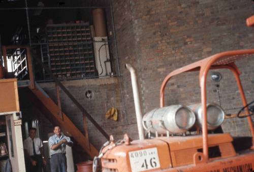 Slide depicting an orange forklift