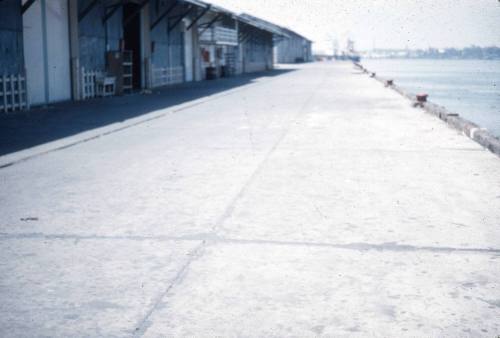 Slide depicting a building on a wharf