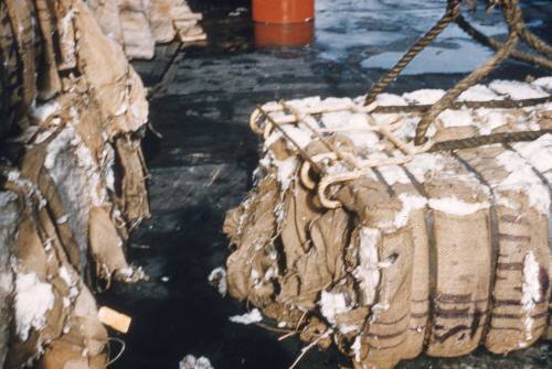 Slide depicting wool being lifted onboard