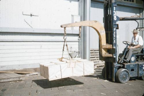 Slide depicting a forklift moving a pallet of materials