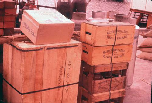 Slide depicting a stack of vineyard wooden crates