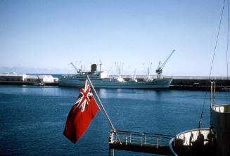 Slide depicting a container ship at port