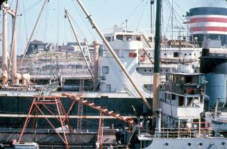 Slide depicting an underwater cable stretching between a ship to a coaster