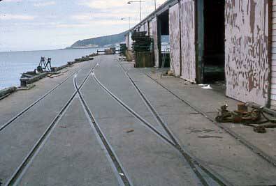 Slide depicting a wharf and wharfside sheds