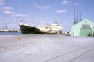 Slide depicting the KOORINGA at wharf