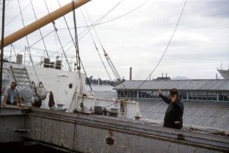 Slide depicting a cable extending down into the hatch of a cargo ship