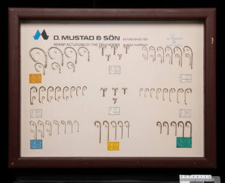 O Mustad & Sön fish hooks sample board