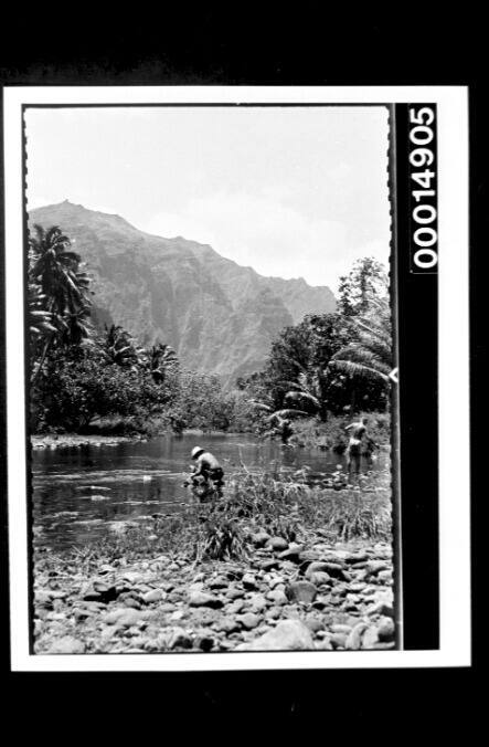 The Nossiters cooling off at a stream, Nuku Hiva Island