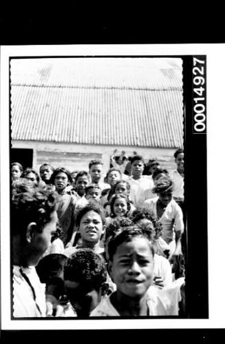 A crowd of young children outside a building, Nuku'alofa, Tonga