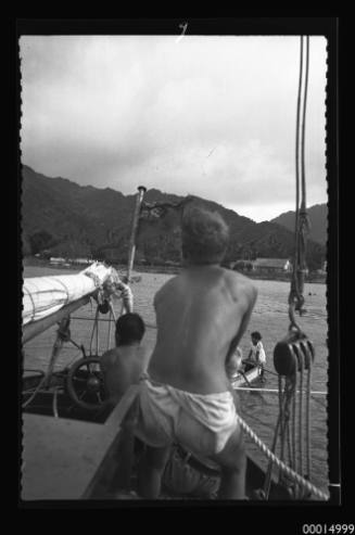 Yacht SIRIUS beside canoe, Rarotonga Island