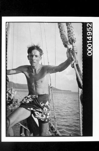 While in Bora Bora, a man wears a pareu on the deck of yacht SIRIUS