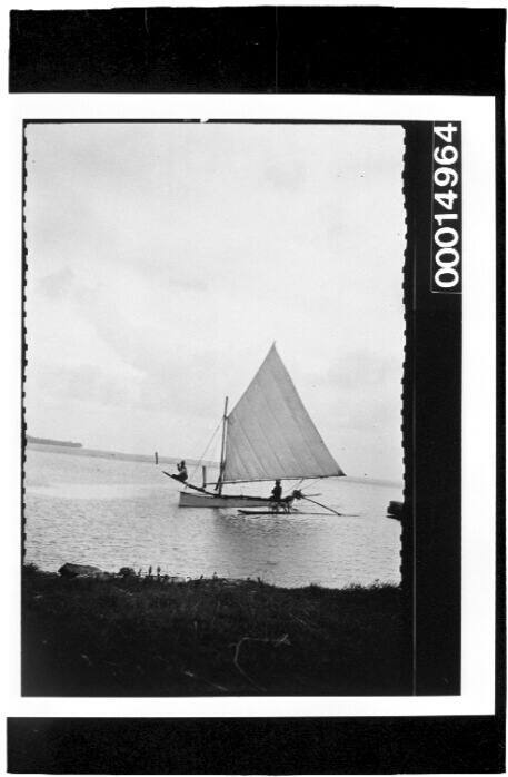 Outrigger canoe under sail, Bora Bora