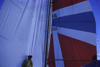 Image of a white, blue and red spinnaker