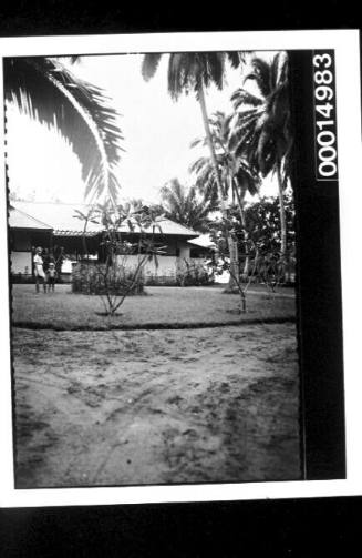 The driveway and tropical garden of a house in Tahiti