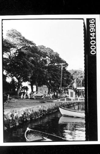 Dinghies moored at the retaining wall of Papeete Harbour, Tahiti