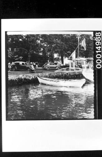 Dinghy moored at the retaining wall of Papeete Harbour, Tahiti