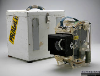 Bolex camera with underwater housing and storage box