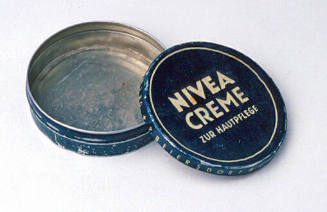 Skin cream tin belonging to a Lithuanian migrant