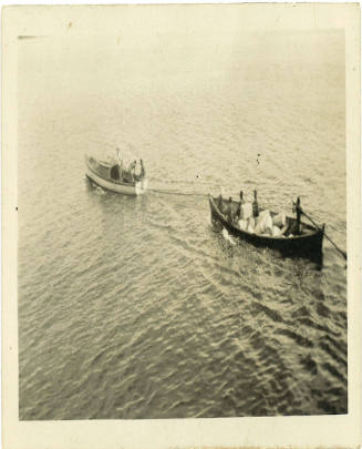 Photograph depicting two small vessels