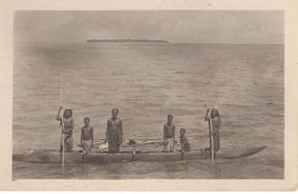 Indigenous people in a canoe